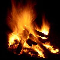 Pixwords Imaginea cu foc, lemn, arde, întuneric Hong Chan - Dreamstime